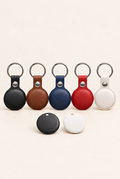 Compass Smart Tag leather cases in black, brown, blue, red and white