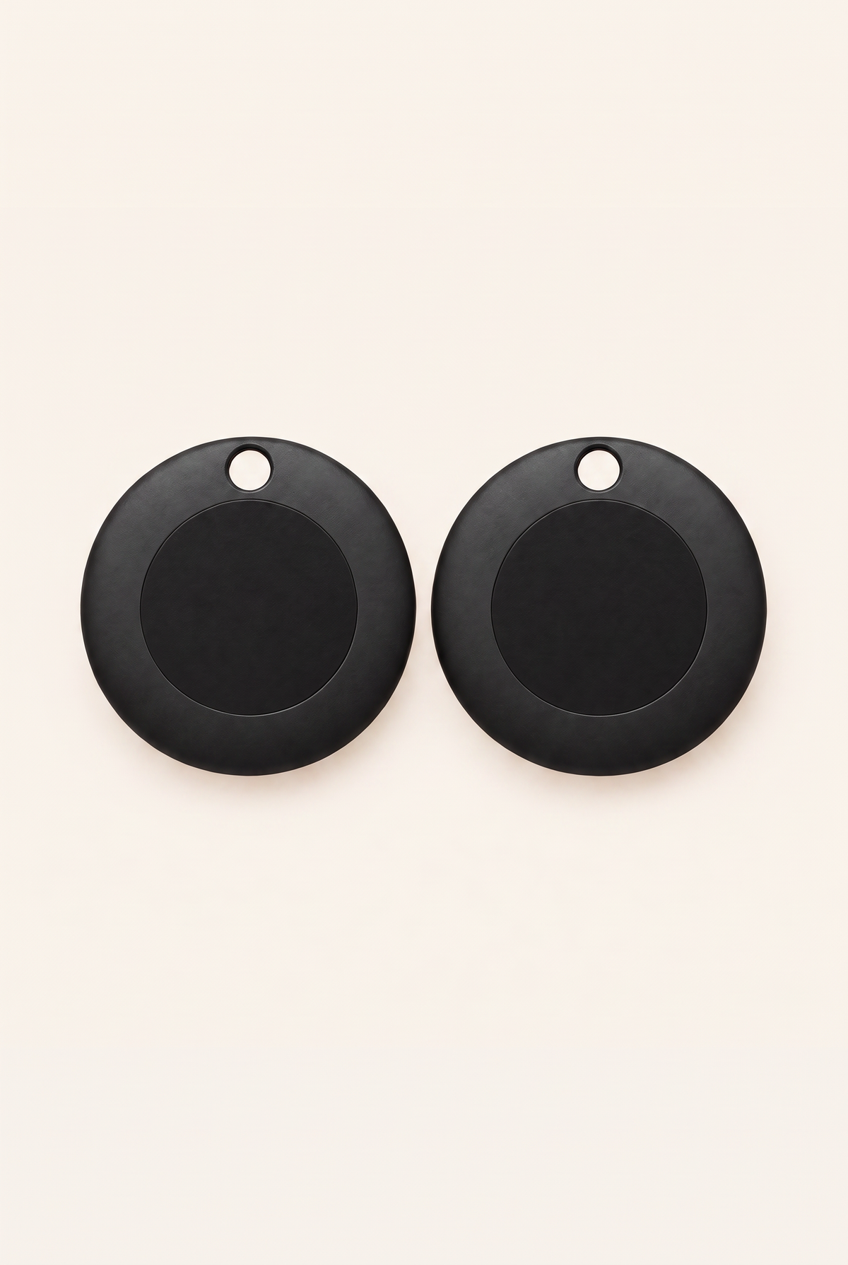 Two black Compass Smart Tag smart tags