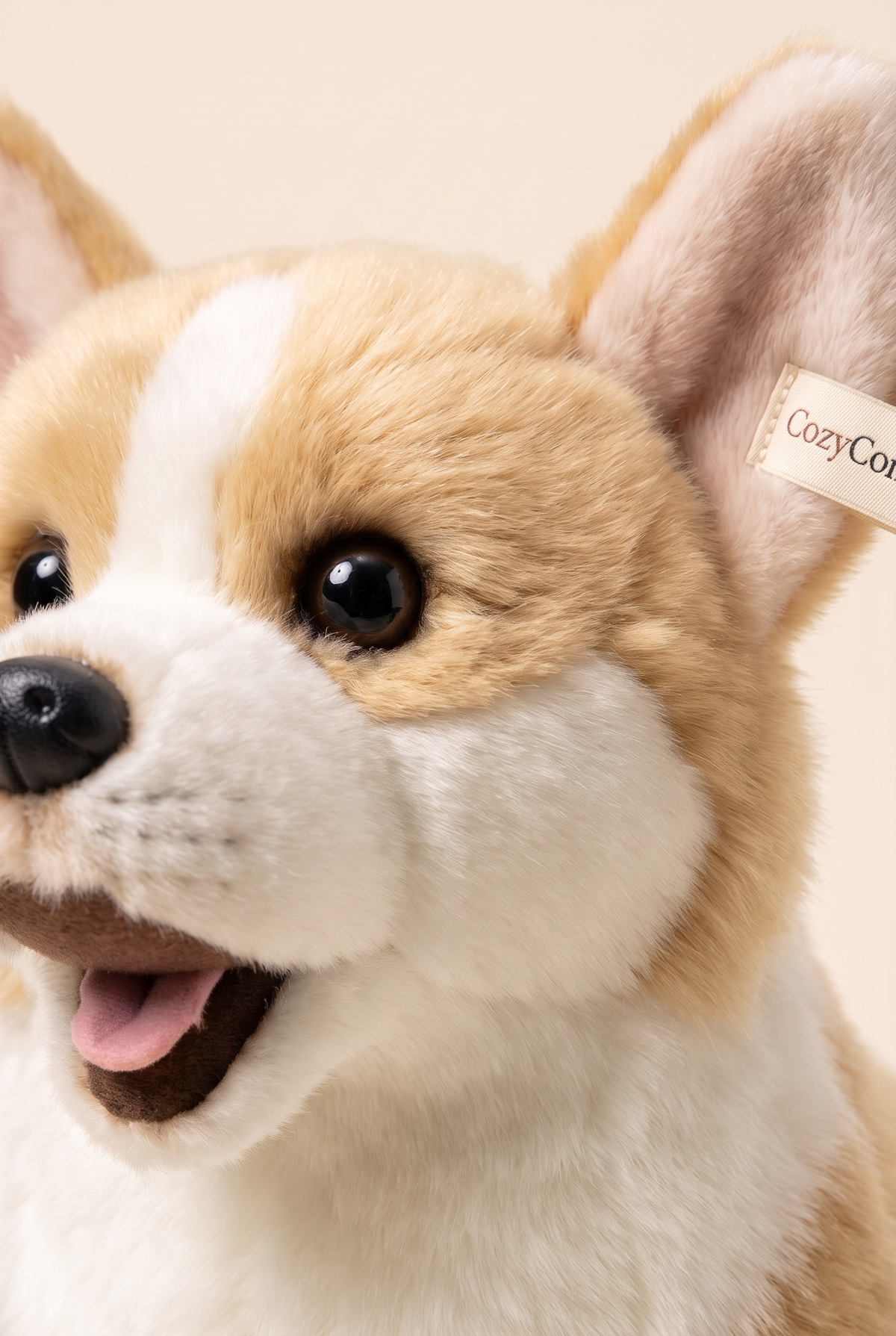 Close-up detail of the Buddy plush toy