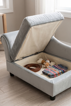 Chaise pet sofa with the seat lifted showing hidden storage