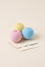 Chirp catnip balls in pink, yellow and blue