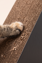 Peak triangle scratcher corrugated edge close-up