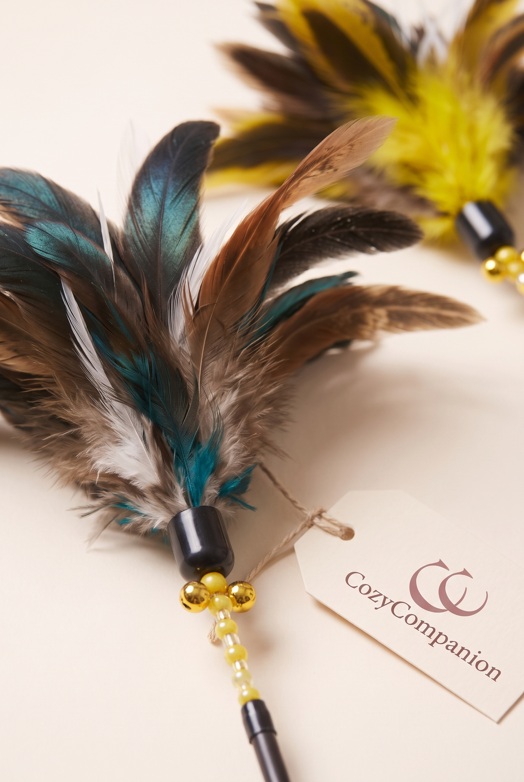 Close-up detail of the Plume teaser wand