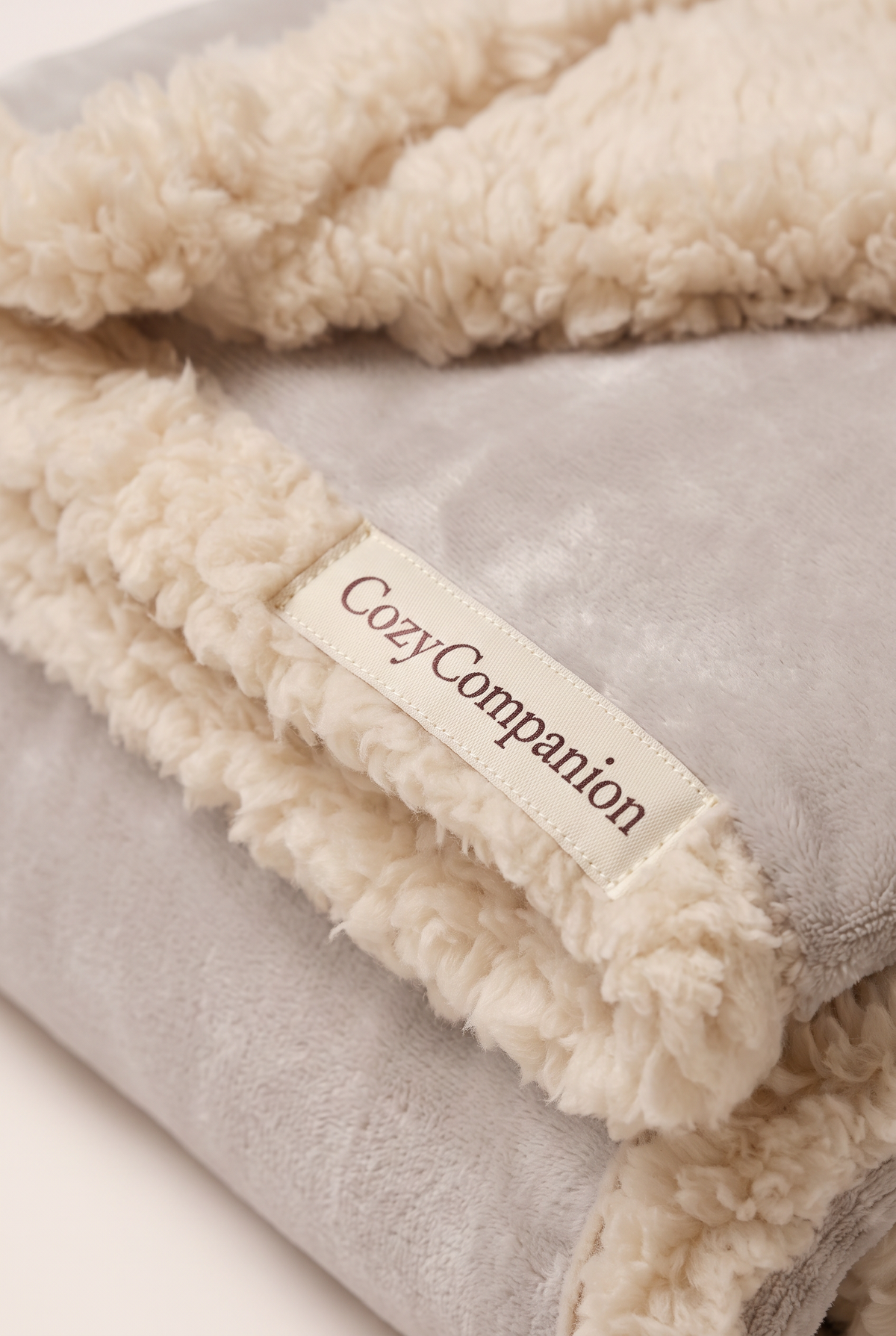 Close-up detail of the Snug sherpa blanket